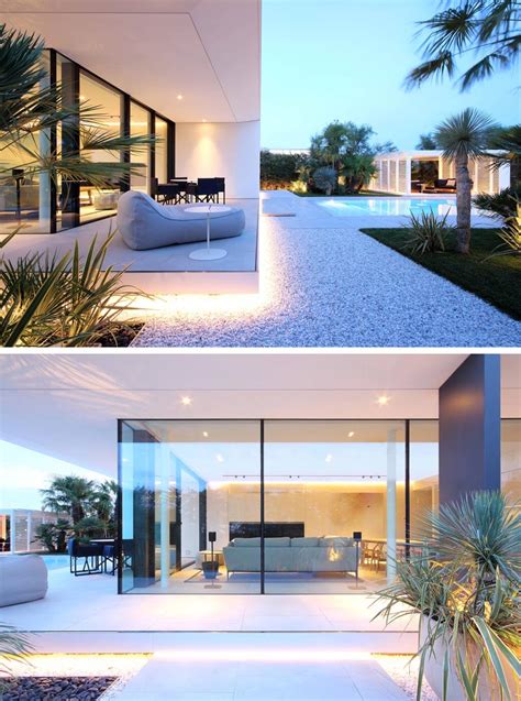 Outdoor Lighting Adds A Dramatic Element To This Modern White House