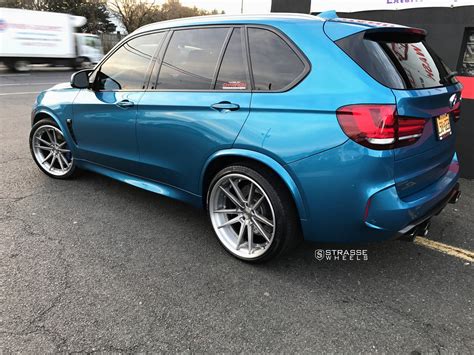 Blue BMW X5 Rocking a Set of Brushed Titanium Strasse Rims — CARiD.com ...