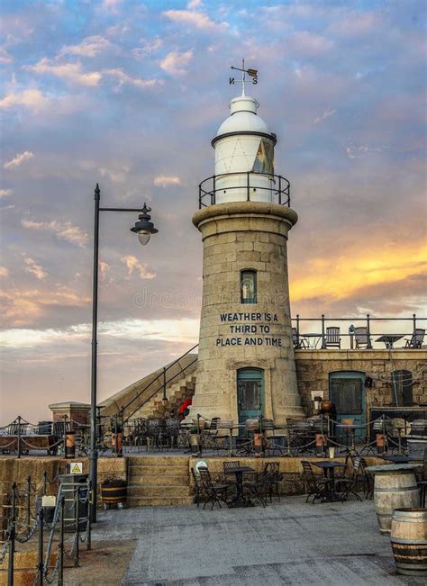 The Folkestone Harbour Arm Lighthouse Stock Photo - Image of building ...