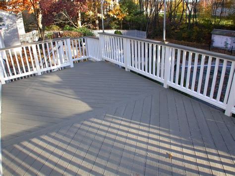 brown deck stain with grey house | Deck paint, Grey deck paint, Decks ...