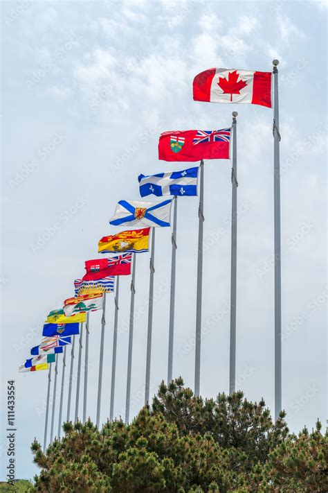 Picture of the canadian Flag along with the flags of the 10 Canadian ...