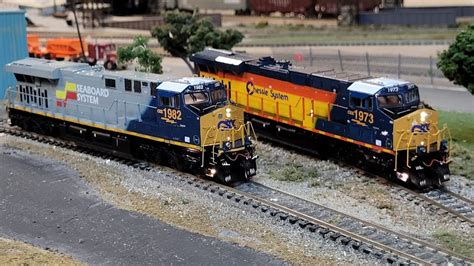 Custom HO CSX Heritage Units- Seaboard System 1982 + Chessie 1973 - YouTube