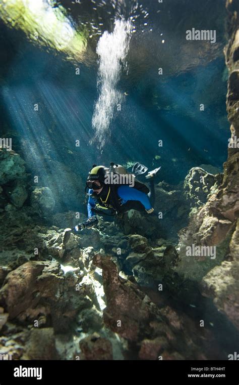 Cave diving in the Cenote cave system in Mexico's Yucatan Peninsula ...