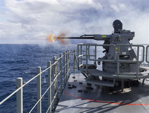 A Typhoon Weapons Station firing it's 25mm Bushmaster Cannon (HMAS ...