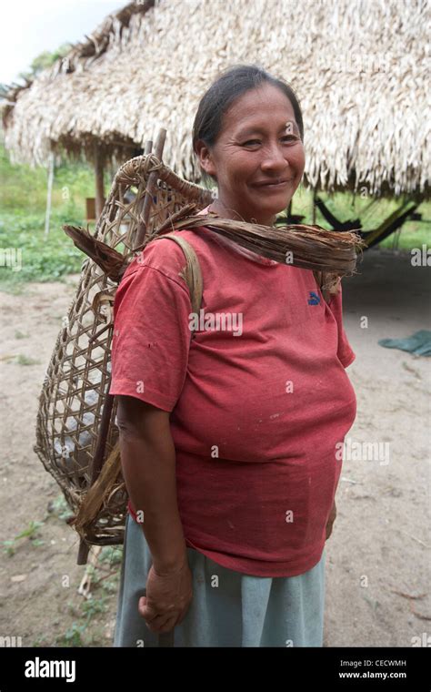 Amerindian woman with a traditional woven carrying basket, Rewa ...