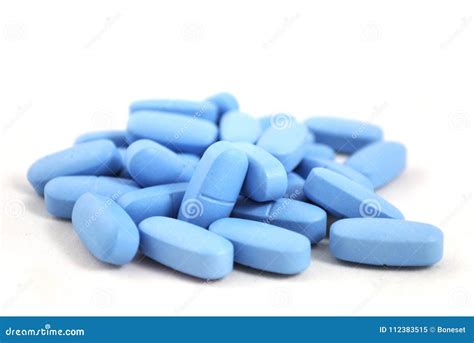 Bright blue oval tablets stock image. Image of antibiotic - 112383515