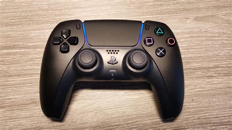 This black PS5 controller is a custom job but it looks good enough for ...