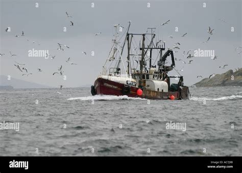 A fishing trawler operating off the West Coast of Scotland Stock Photo ...