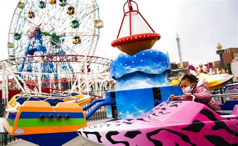 NYC’s Coney Island amusement park reopens at limited capacity ...