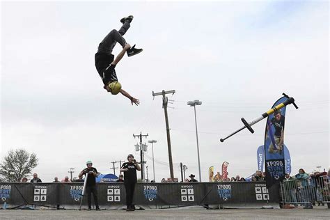 Daredevil pogo-stick stuntmen wow the crowd