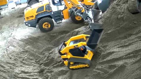 RC BRUDER TOY CAT BOBCAT SKID STEER CONSTRUCTION MODEL - YouTube