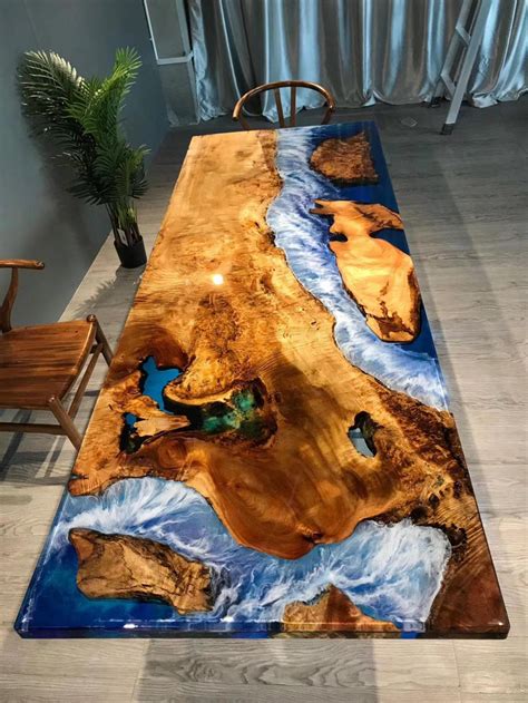 This Blue River Epoxy Table Is Made To Look Like a Satellite View Of Earth