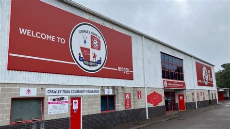 Goalkeeper targeted by missiles thrown by Crawley fans during game ...