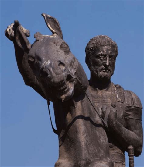 Statue of Philip II of Macedon. Note the scar above and below the right ...