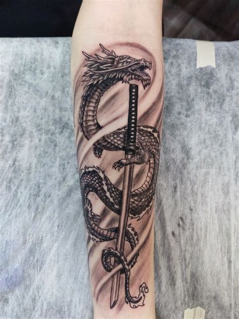 Discover more than 59 dragon sword tattoo best - in.cdgdbentre