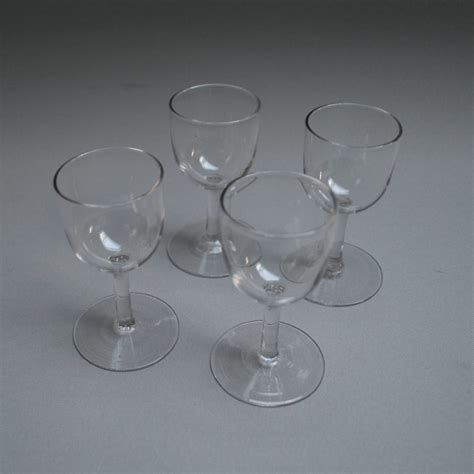 A set of four glass sherry glasses - Williams Antiques