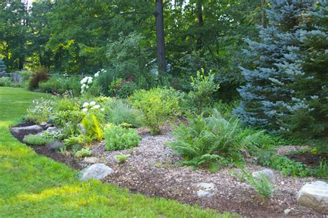 "Creating A Landscape Berm" by Dorian Winslow | womanswork.com