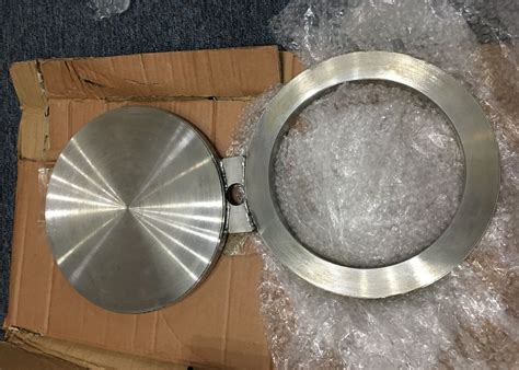 Spectacle Blind 4" ASTM A105 300Lbs Raised Face Flanges