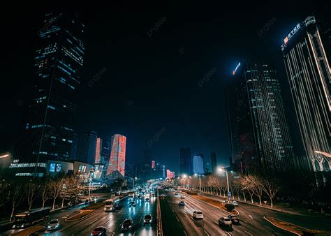 Background Foto Bangunan Bertingkat Tinggi Dan Kendaraan Di Jalan Pada ...