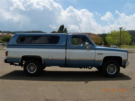 Chevy Silverado 4x4 with Camper shell.