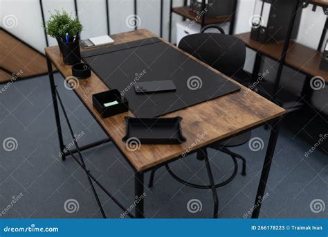 Office Desk with Office Supplies in an Empty Office Stock Image - Image ...