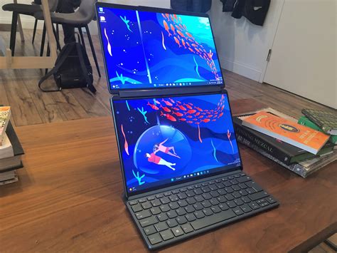 Lenovo demos laptop that rolls from 13 to 15 inches with the flip of a ...