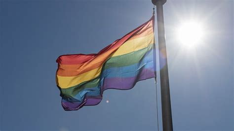 Pride flag raised above Toronto Police headquarters for the first time ...