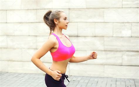 Fitness woman running in city, female runner workout - sport and ...