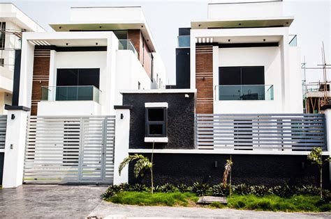 A newly built modern-style terraced home and its twin that are each on ...