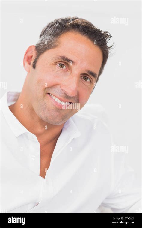 Man smiling at camera Stock Photo - Alamy