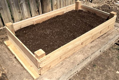 How To Fill a Raised Garden Bed with Soil Layers