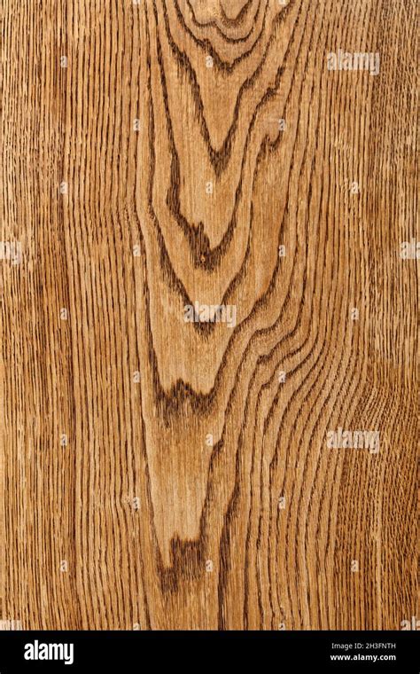 An expressive pattern of wavy light oak wood grain in the form of a ...