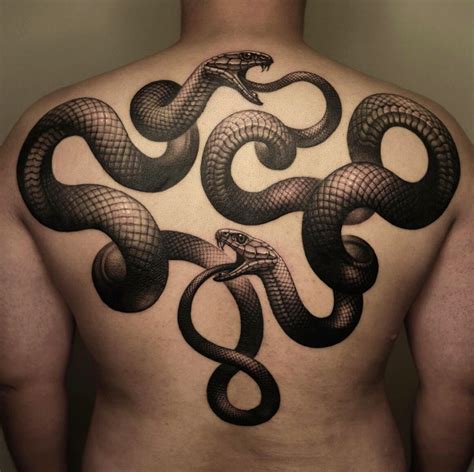 The changing skin of the snake - Tatuajes y Perforaciones en Bogota