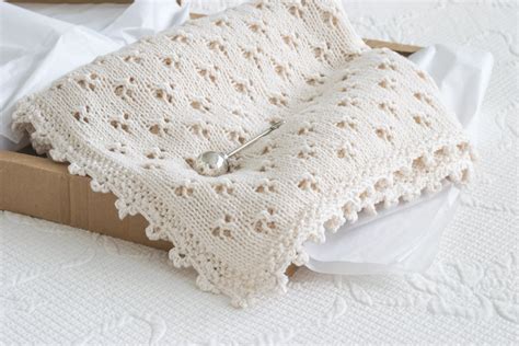 Knit Baby Blanket with Cloverleaf Eyelet Stitch • Nourish and Nestle