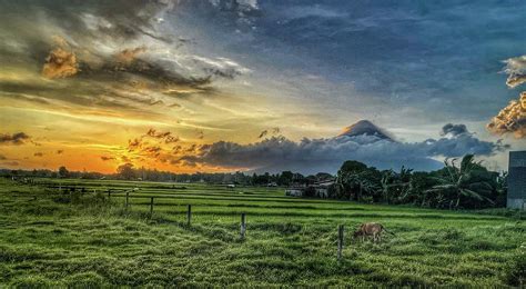 Sunset at the Mayon Volcano Photograph by William E Rogers - Fine Art ...