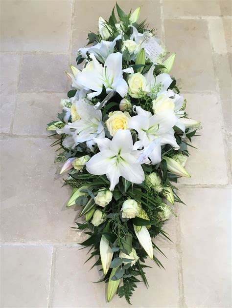 White lily and Rose Funeral Coffin double ended spray | Funeral flower ...