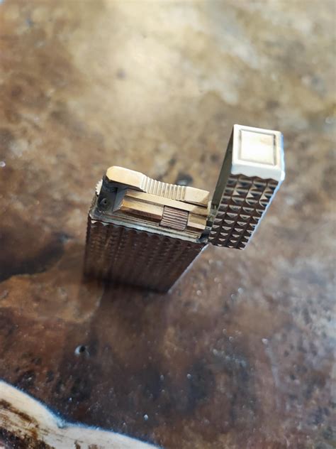 hello there! could anyone help me identify the lighter and maybe the ...