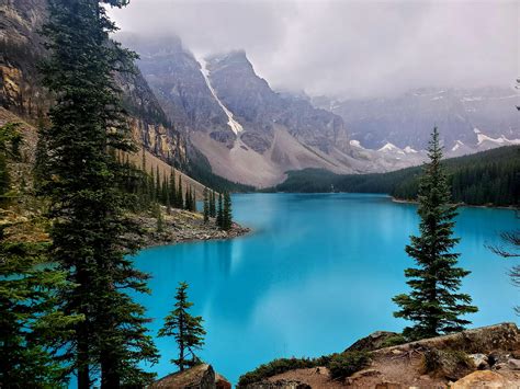 Moraine lake at Banff National Park in Alberta, Canada on a cloudy day ...