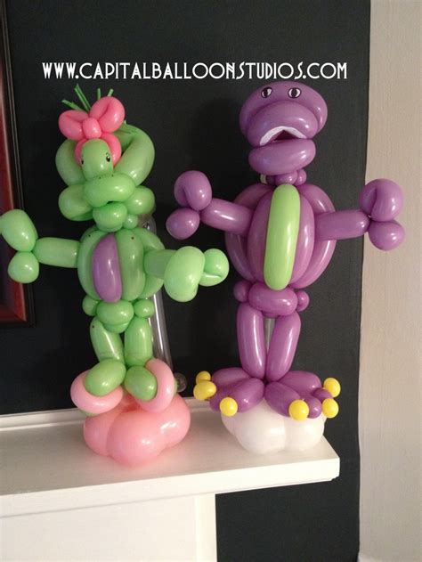 Baby Bop and Barney | Balloon animals, Animated characters, Balloons