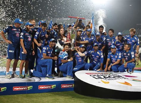 Mumbai Indians pose with the Champions League trophy | ESPNcricinfo.com