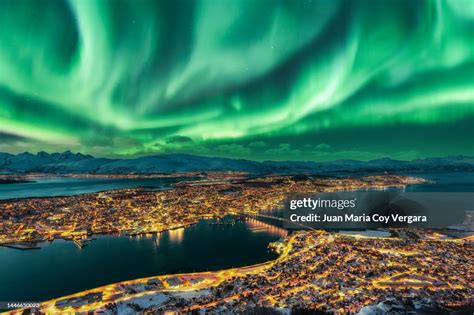 Aurora Borealis Dancing Over Tromso Urban Skyline Northern Norway High ...