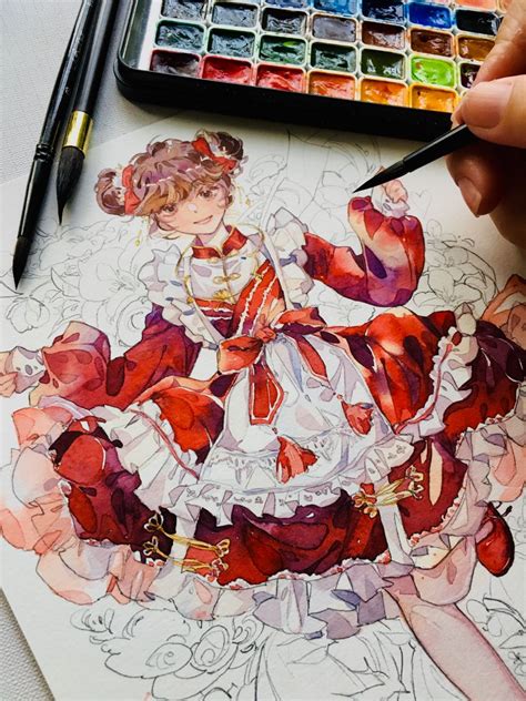 a person is drawing with colored pencils on paper