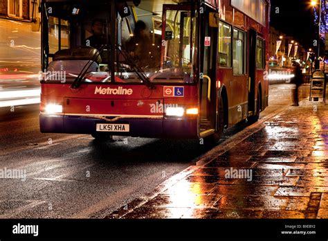 Double Decker London Bus at night Stock Photo - Alamy