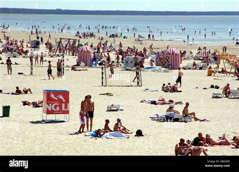 People enjoy the sun at Parnu beach Estonia Stock Photo - Alamy