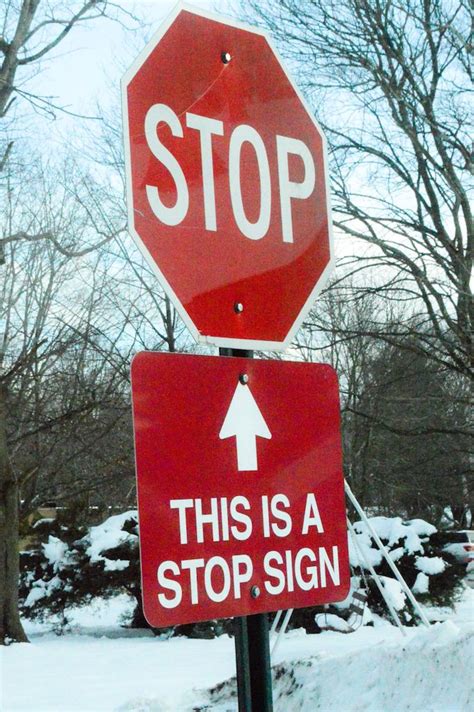 This stop sign has a sign under it to remind you that the above stop ...