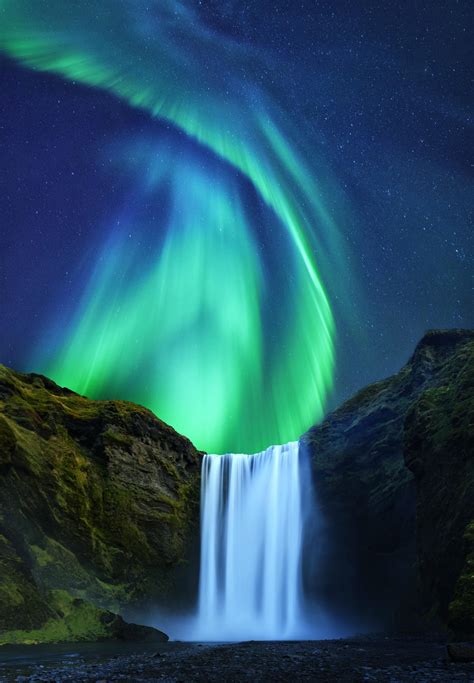 Aurora Borealis over Skogafoss in Iceland... | Nature pictures, Nature ...