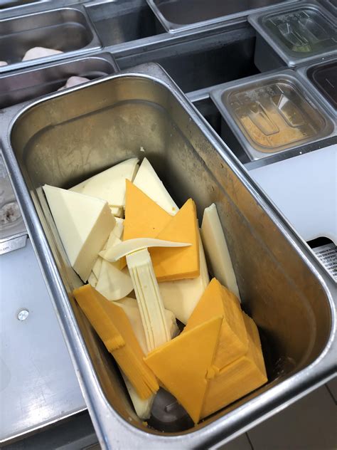 My closer has a unique way of organizing the cheese bin : r/subway