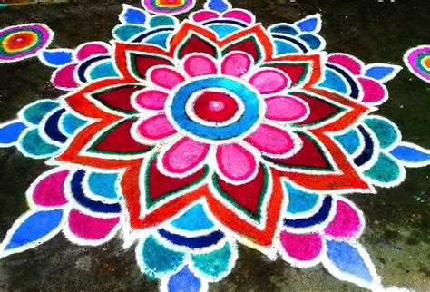 Rangoli design Rangoli, also known as kolam or Muggu, is a folk art ...