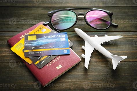 Passport and credit card on wooden desk 11388710 Stock Photo at Vecteezy