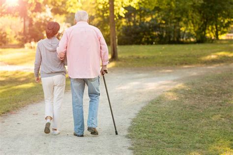 senior with cane | A+ Stairlifts